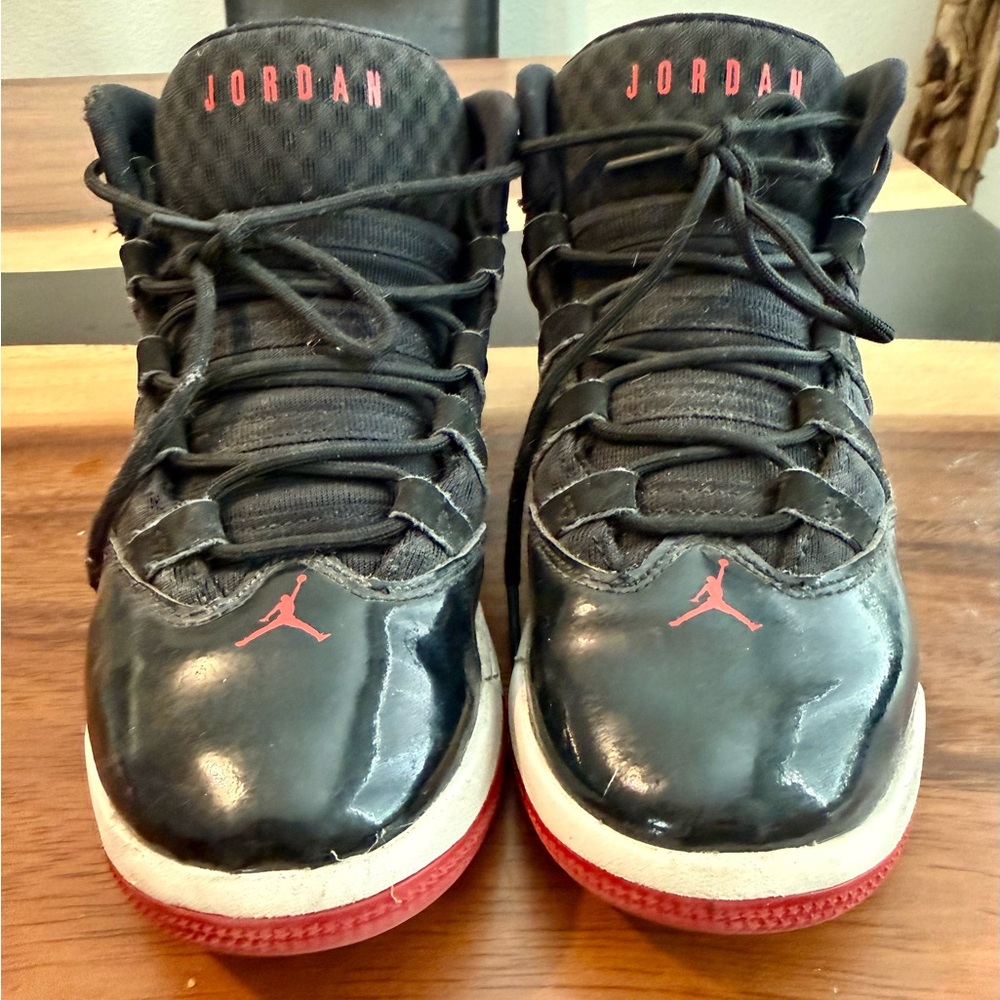 Nike Kids Black and Red Jordan’s